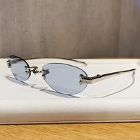 Lunettes de soleil ovales en métal sans monture, nouvelle collection 2026, style tendance européen et américain, même style que les influenceurs Instagram.