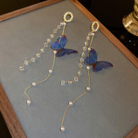 Boucles d'oreilles papillon bleues à pampilles longues, chaîne dorée, perles blanches, bijoux féériques romantiques pour l'été, pour femmes et filles