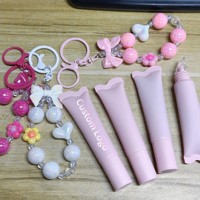 Baume à lèvres hydratant brillant à marque privée, tubes souples, gloss à lèvres avec porte-clés mignon, huile à lèvres repulpante