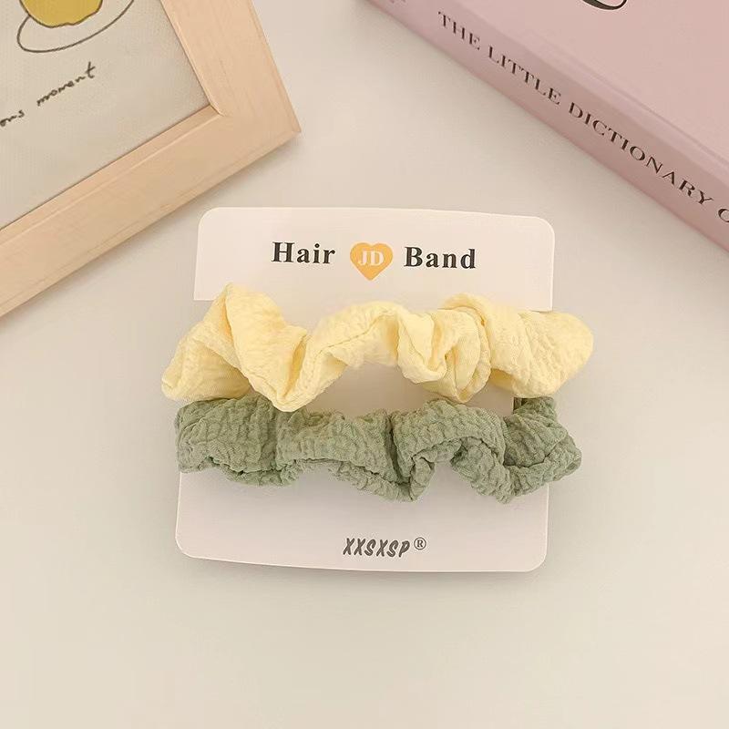 ชุดสองชิ้นสีเหลืองและสีเขียว3ชิ้น