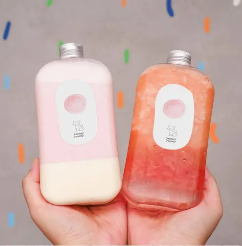 2022 nouveau 200ml 300ml 400ml 500ml en plastique PET presse-agrumes bouteilles de boisson avec couvercles pour jus Smoothie boire à froid