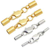 Vente en gros de fermoirs cylindriques en acier inoxydable plaqué or de 2 mm pour cordon en cuir, fermoirs à boucle pour cordon, fermoirs unisexes avec fermoir à homard