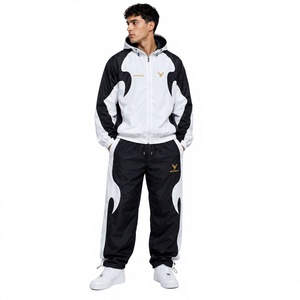 Conjunto de 2 piezas de pantalones deportivos softshell con cremallera personalizados para hombre, con ribetes elásticos en las puños, chándal unisex de nailon con bloques de color y cortavientos. - Product Image 1