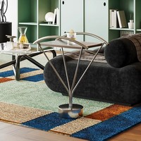 Table basse moderne en acier inoxydable avec rangement et design durable pour les espaces de vie compacts