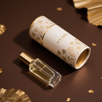 Boîte cylindrique texturée de luxe recyclable 100% personnalisée, ensemble d'emballages de parfum écologiques de 6ml avec tube en papier carton
