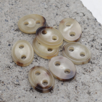 Botones de cuerno de buey auténtico de 2 agujeros ovalados Beige de alta calidad, botones de Nariz de cerdo de cuerno de búfalo, botones decorativos de cuerda