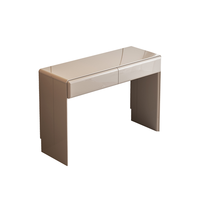 Table de maquillage moderne à finition brillante, table de toilette gris champagne avec tiroirs doublés de velours pour chambre d'hôtel