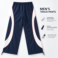Pantalon de survêtement vintage haut de gamme 100 % nylon, personnalisé OEM, avec broderie artistique, coupe décontractée, taille élastique, style streetwear pour homme