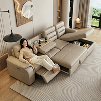 Canapé-lit sectionnel moderne de luxe en cuir véritable avec fauteuil inclinable électrique, rangement et table porte-gobelets pour salon