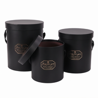 Boîte cylindrique ronde noire de luxe avec poignée, logo personnalisé en feuille d'or, boîte cadeau rigide en papier pour rose fraîche ou préservée