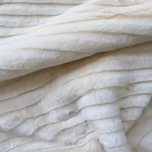 Material de tapicería de rayas esponjosas de poliéster de pelo de conejo de imitación cálido tela de piel sintética de felpa larga