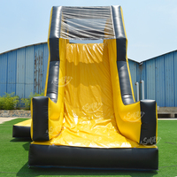 Mur d'escalade gonflable commercial avec toboggan sec, combo extérieur jaune et noir pour location en parc d'attractions
