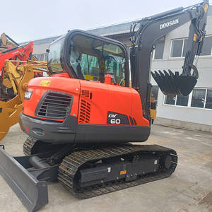 Excavatrice sur pneus Doosan DX60 d'occasion à prix avantageux, 6 tonnes, moteur hydraulique, modèle 2014, haute performance, en vente - Product Image 1