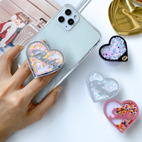 Support de téléphone portable réglable anti-fuite en PC, style dessin animé TikTok, avec paillettes liquides colorées et motif cœur, accessoires mobiles