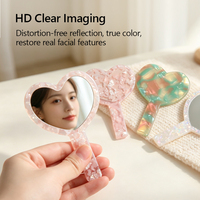Miroir de poche compact personnalisé en acétate en forme de cœur avec logo, idéal pour les boutiques, la vente au détail et les coffrets cadeaux