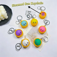 Porte-clés jouet anti-stress lumineux en forme de boulette de raviolis vapeur de 4 cm, jouet sensoriel en forme de nourriture colorée arc-en-ciel pour soulager le stress