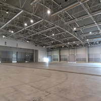 Entrepôt et atelier préfabriqués en acier certifiés CE, fabricant avec 15 ans d'expérience dans l'exportation de bâtiments industriels