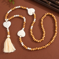 Collier pendentif étoile en perles de bois naturelles style bohème avec franges, commande en gros, directement de l'usine, bijoux écologiques pour tenues de villégiature