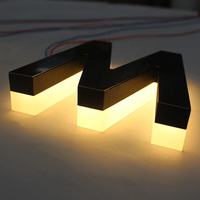 Enseigne lumineuse LED personnalisée avec corps en acier inoxydable, bandes LED et lettres rétroéclairées pour les murs d'hôtels et de bureaux