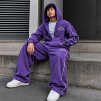 Ensemble de survêtement streetwear personnalisé par le fabricant, avec pantalon de survêtement et sweat à capuche amples, à surpiqûres contrastées, en tissu épais et de coupe oversize