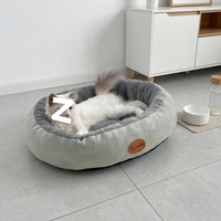 Coussin de couchage rond de luxe en peluche colorée pour animaux de compagnie, chien et chat, confortable et chauffant, fournitures et équipement personnalisés OEM en gros