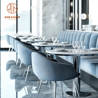 Ensemble de meubles de restaurant et d'hôtel sur mesure Ron Group : table ronde en marbre élégante et chaise en velours