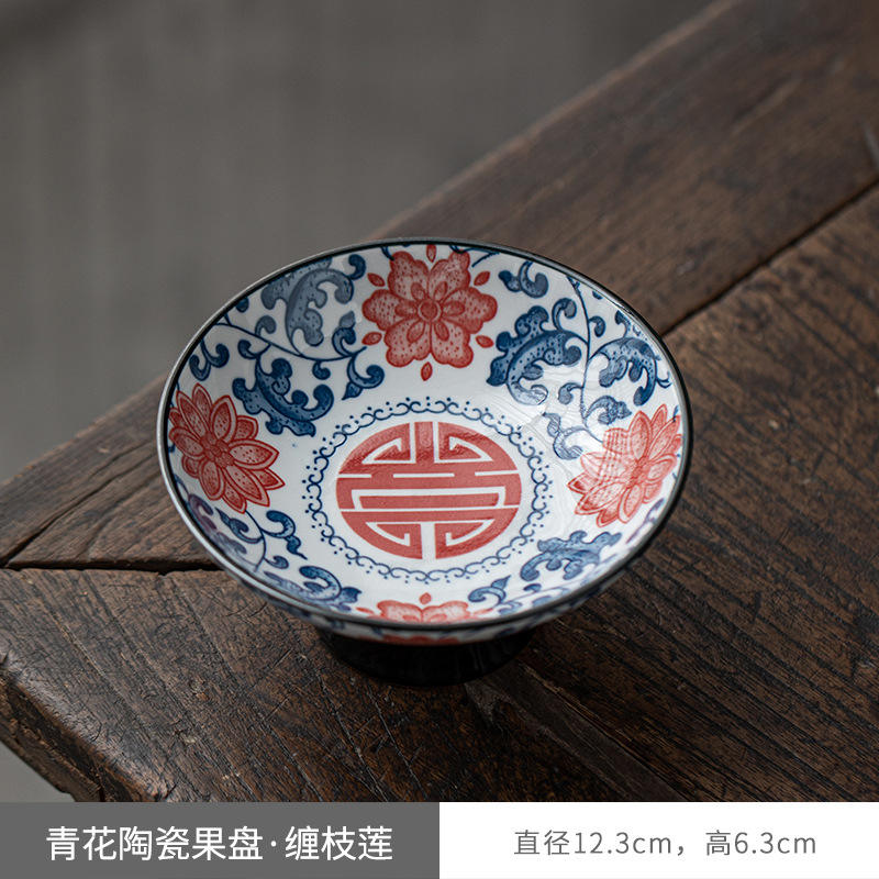 สเตลเลียฟลาวเวอร์ขนาดเล็กจานผลไม้สีน้ำเงินและดอกไม้