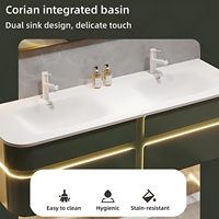 Meuble-lavabo de salle de bain mural de luxe, design moderne et personnalisé, vert, avec double tiroirs, éclairage LED et vasque intégrée en dalle.