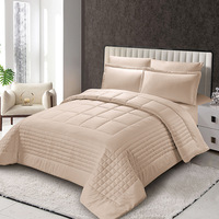 Nouveau design ensembles de literie en coton dans un sac doux et chaud avec ensemble de couette et ensemble de draps solides taie d'oreiller mode matelassée
