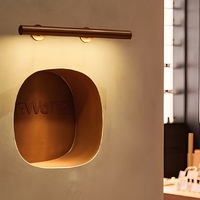 Parfumerie unique Comptoir présentoir de parfums en marbre à design d'intérieur Placage de bois Armoire à parfums arquée