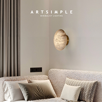 Applique murale artisanale en albâtre en forme de galet |   Applique murale LED minimaliste en laiton pour couloir