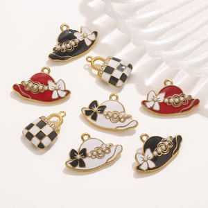 เครื่องประดับรูปหมวกและกระเป๋าถือเคลือบเงา18K PVD ชุบทองจี้สแตนเลสหมวกแฟชั่นสำหรับผู้หญิงพร้อมไข่มุกและโบว์สำหรับทำเครื่องประดับ - Product Image 2