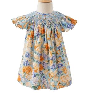 Robe smockée vintage à imprimé floral bleu et orange 100% coton doux pour bébé fille avec manches volantées - Product Image 1