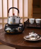 Théière et bouilloire portables en argent pur S999 de 700 ml, résistantes à la chaleur, avec infuseur, artisanat moderne et classique, pour la maison et les professionnels.