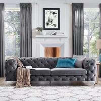 Canapé Chesterfield trois places en velours vert, style traditionnel de luxe, pour salon, appartement, ou chambre d'hôtel, capitonné