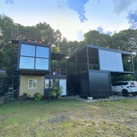 Maison préfabriquée modulaire à haute durabilité et au design créatif unique, idéale pour les espaces commerciaux, de bureau ou les lieux de réputation en ligne.