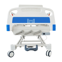 Lit d'hôpital médical manuel Careland à 3 manivelles, trois fonctions, pour soins intensifs, avec matelas, poteau porte-perfusion et table repas - Offre Spéciale
