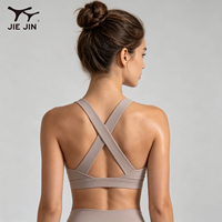 Soutien-gorge de sport JIEJIN OEM à impact moyen, séchage rapide, sexy, dos croisé, pour femme, push-up, idéal pour le Pilates
