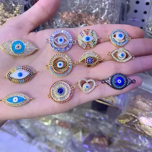 Venta al por mayor de Latón chapado en oro encanto diablo ojo pulsera conector para la fabricación de pulsera