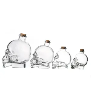 Marca KDG, 50ml, 150ml, 400ml, 750ml, gran oferta, suministro de fabricantes, tarros y botellas de vidrio vacíos con forma de calavera transparente para licor