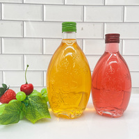Bouteilles en verre élégantes de 250 ml, 330 ml et 500 ml avec logo en relief floral pour jus de fruits et boissons