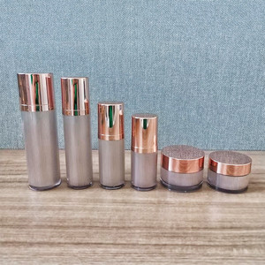 Lọ Bơm Không Khí Huyết Thanh Acrylic Hình Trụ Tròn Màu Vàng Hồng Và Lọ Mẫu Mỹ Phẩm 30g50g Có Lưới - Product Image 1