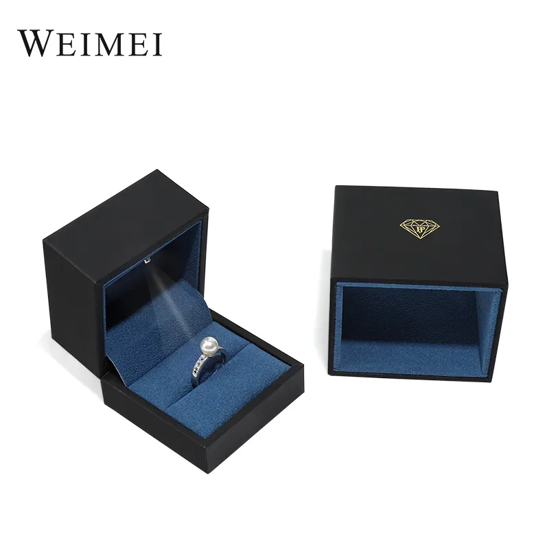 Tiroir personnalisé papier de spécialité en daim bleu estampage à l'or emballage de pochette de lumière de luxe anneau personnalisé boîte à bijoux LED