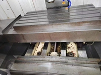 Centre d'usinage CNC Dalian système CNC 850 Guangzhou à trois axes et système Suzhou 1160 Vanaco à quatre axes avec bibliothèque de couteaux