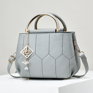 Top Grade PU Leather Soft Surface Solid Color Grid Texture Fashionable Women Travel Pendant Handbag - Product Image 1