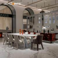 Table à manger avec pieds en arche, luxe italien, table à dîner en marbre Karakata, mobilier de salle à manger moderne haut de gamme pour la maison