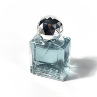 Bouteilles en verre rectangulaires avec couvercles, flacon vide en verre de forme sphérique, atomiseur de parfum, flacon de parfum de luxe 50 ml