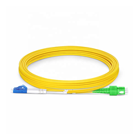 Kabel Patch Fiber Optik Single Mode OS2 2 Serat LC UPC ke SC APC Duplex Tight-Buffered OFNR Jumper Cable 2.0MM