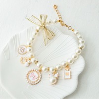 Collier en ruban luxueux et mignon pour chats et chiens, motif de dessin animé, clochette intégrée, confortable à porter, accessoire haut de gamme
