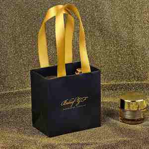 Sac en papier personnalisé recyclable à la vente chaude pour chaussures, chaussettes, vêtements, sac de shopping écologique en kraft avec poignées plates torsadées - Product Image 5